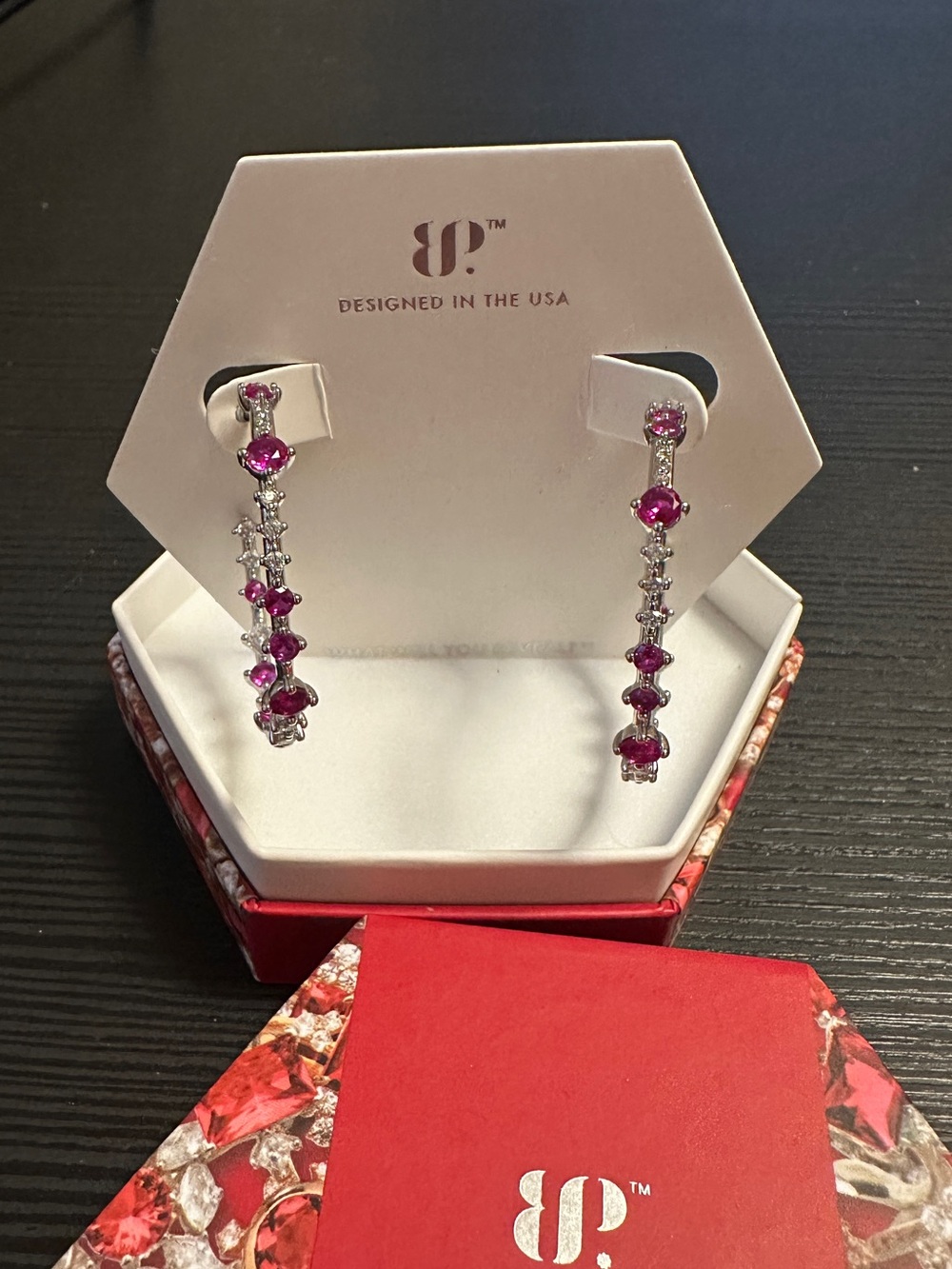 Bomb Party July Birthday 2025 Twinkle in Time Hoop Earrings Ruby on Rhodium - Picture 3 of 4